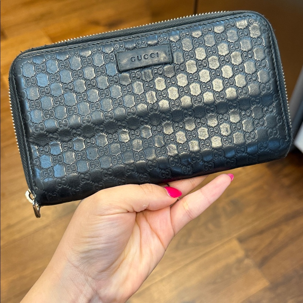 Gucci Black Embossed GG Zip-Around Leather Wallet